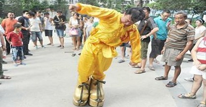 Chinese man’s iron shoes up for Guinness record